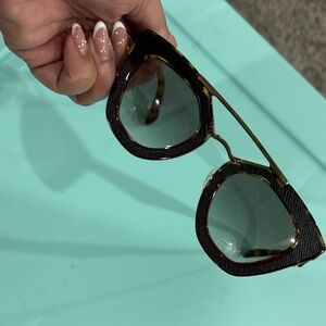 Prada Black Tortoiseshell Cat-Eye Sunglasses with Gold Accents